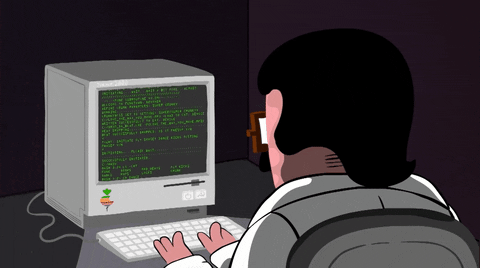 Cartoon man types code on an old-school desktop computer.