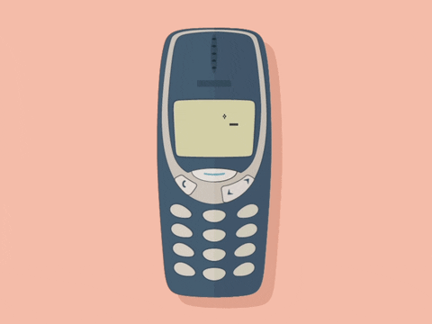 GIF animation of a Nokia phone displaying the Snake gameplay.