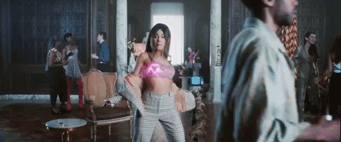 Ariana Grande emitting laser hearts