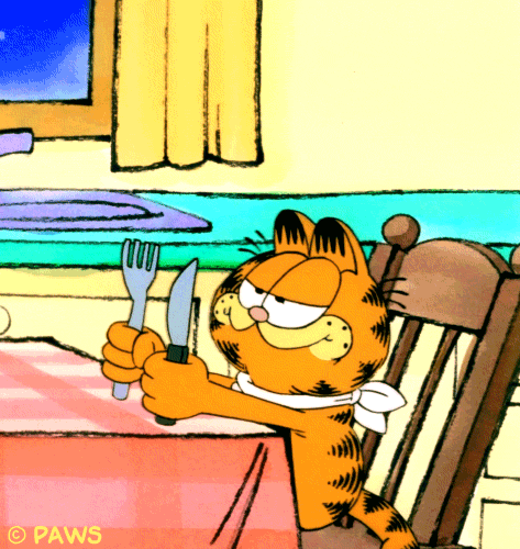 Imagem animada do Garfield batendo suavemente com talheres na mesa, como que esperando uma refeição. Esperando o pastel da feira, com certeza. haha