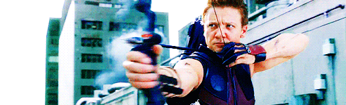 GIF of Hawkeye (Jeremy Renner) prepared to shoot his bow and arrow in The Avengers