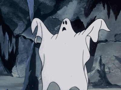A cartoon bedsheet-style ghost waves its arms while floating