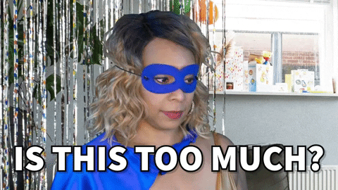 Product maturities - animated GIF: A woman in a superhero costume wonders "Is this too much?"