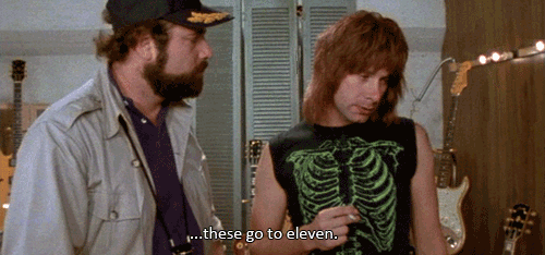 From the movie "This is Spinal Tap". A man indicates offscreen guitar amps and says "These go to eleven."