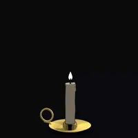 A single lit candle in a brass holder on black