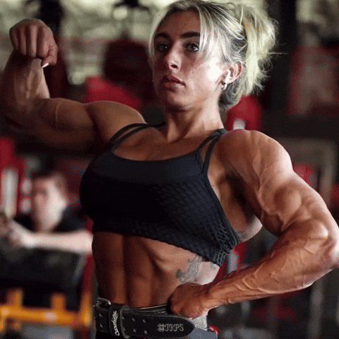 Bodybuilder flexing after a workout