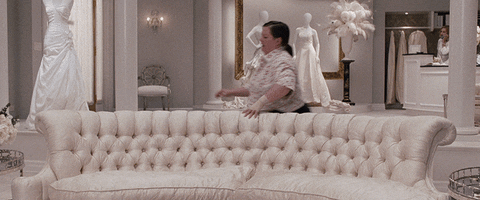 falling bridesmaids couch melissa mccarthy