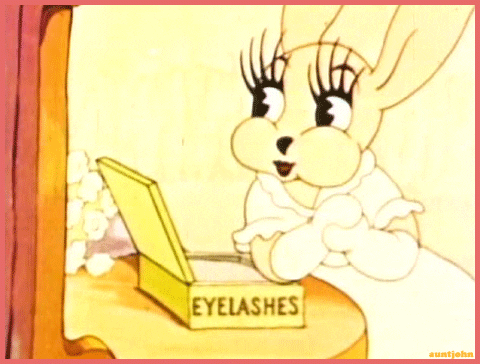 a gif of a vintage cartoon bunny fluttering her eyelashes