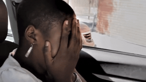  reaction scared nervous hiding issa rae GIF