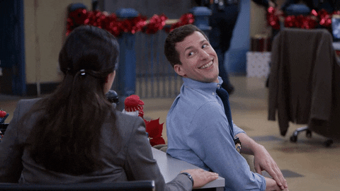Jake Peralta excitedly giving Amy Santiago an encouraging thumbs up