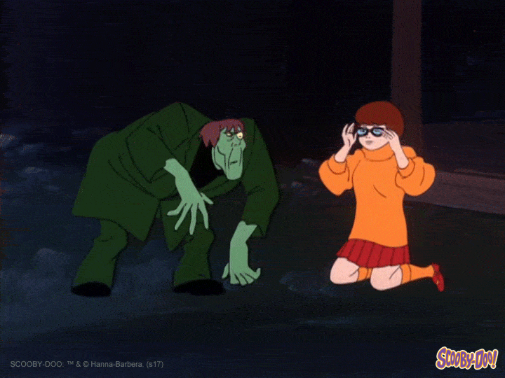 Velma from Scooby Doo finds her glasses and suddenly sees a monster