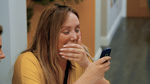 police jokes, woman laughing at her phone