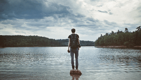 Man standing in a shallow lake. Originally found through pexels.com after an "introvert" or "introversion" search.