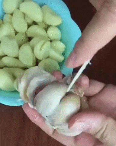 Peeling garlic is satisfying in satisfying gifs