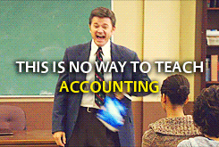 Accounting teacher jumping on desks with his students