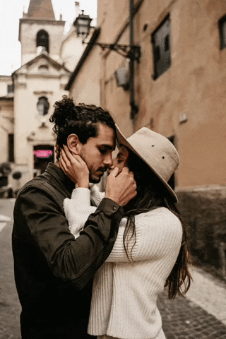 gif couple kissing in the city