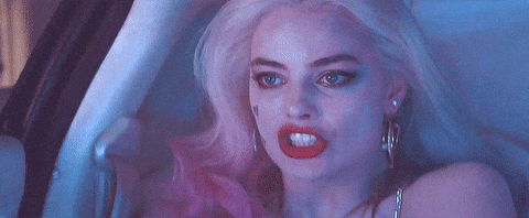 harley quinn and the joker in a car gif 