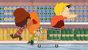 three kids running around a supermarket on a trolley
