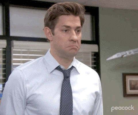 Jim from The Office shrugging