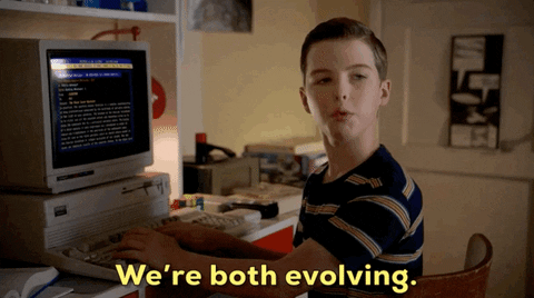 A young boy sitting at a computer acknowledging that SEO is changing every year