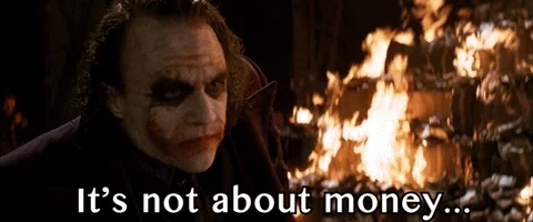 The Joker sets a pile of money on fire: It's not about money