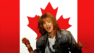 Robin from How I Met Your Mother dancing in front of a Canadian flag