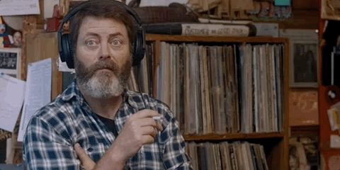 Actor with headphones on saying 'I Cannot Hear You'