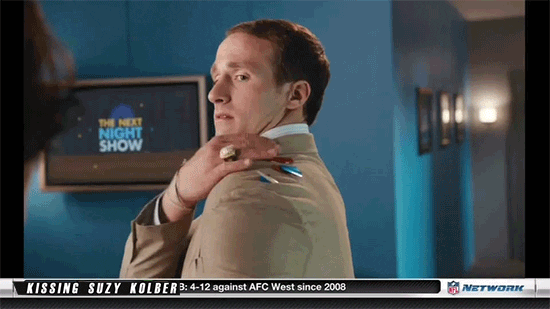 GIF of a man brushing confetti off his shoulder