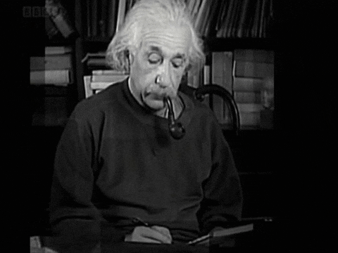 Albert Einstein entrain de fumer la pipe