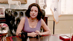 a gif of a woman in her office feeling tired