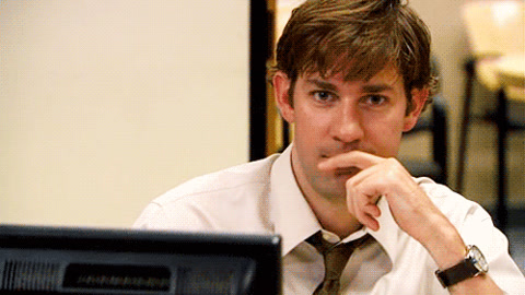 The Office: Jim Halpert, hand on his chin, looks straight at the camera.