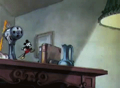 Image result for mickey at a desk working gif