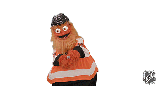 Philadelphia mascot Gritty throwing confetti and doing his infamous dance
