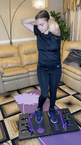 Standing knee tuck with resistance band .Gif