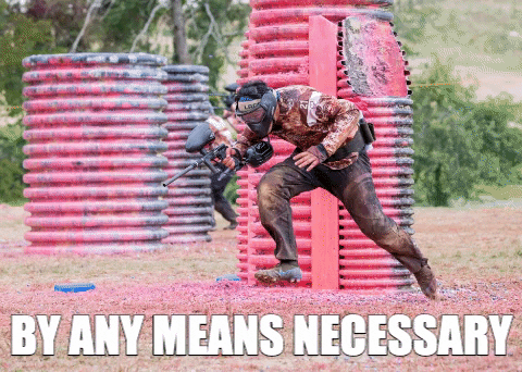 man enjoys playing paintball