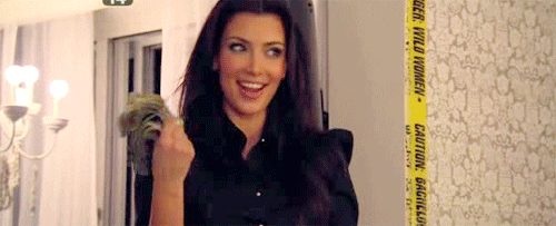 Kim Kardashian, a woman holding a piece of broccoli in her hand at a Quinceanera celebration