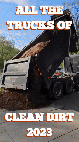 Dump Trucks Unloading Clean Dirt