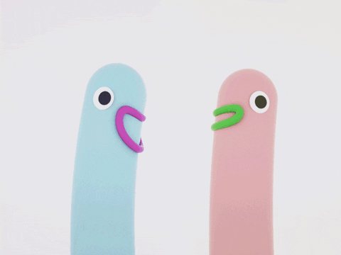 two thin vertical noodles with faces talking to each other