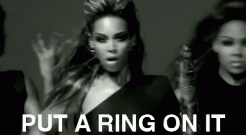 [Image description: Beyonce dancing with the words "put a ring on it".] Via Giphy.com