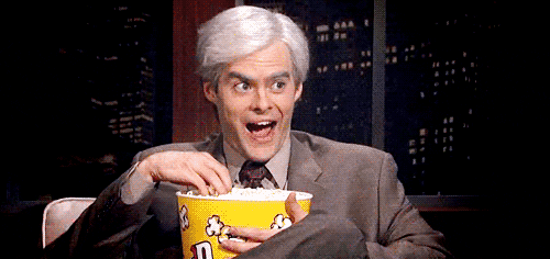 GIF of comedian Bill Hader eating popcorn