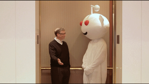 Bill gates with a man dressed as reddit's icon gif