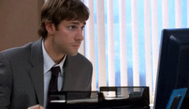 Jim from the show The Office staring at a computer screen