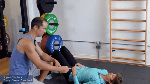 forward head posture exercise - supine chin tuck