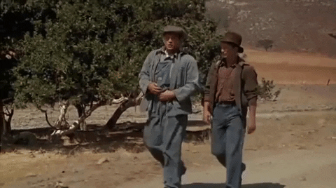 Gif of men from Of Mice and Men walking.
