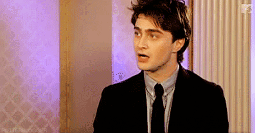 Actor Daniel Radcliffe looking shocked in an interview 