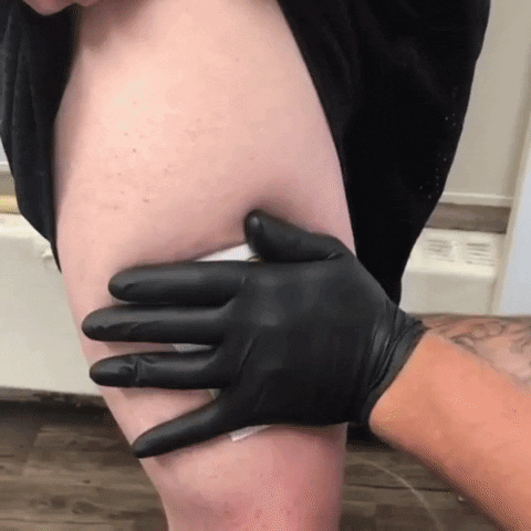 Getting a tattoo in funny gifs
