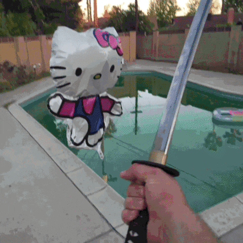  attack sword hello kitty slice samurai sword GIF