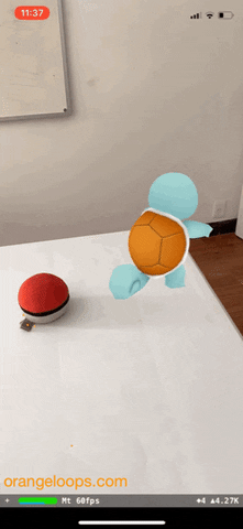 Screen recording of an iPhone showing a virtual Squirtle falling from a table