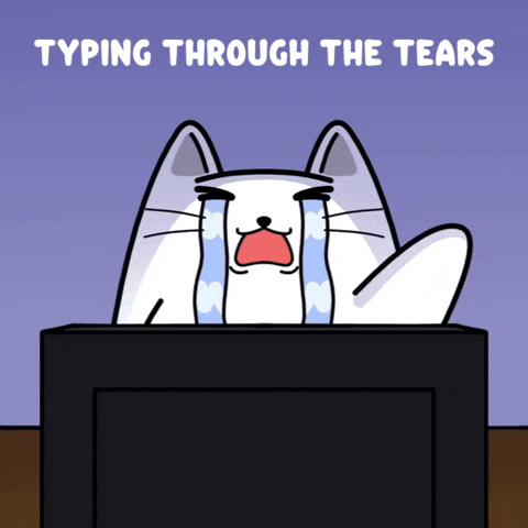 Stretching and looking exhausted at the desk