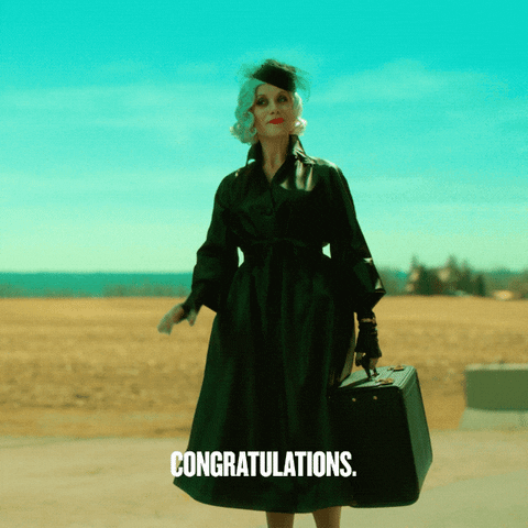 The Handler from The Umbrella Academy in the middle of a desert road: 'Congratulations'